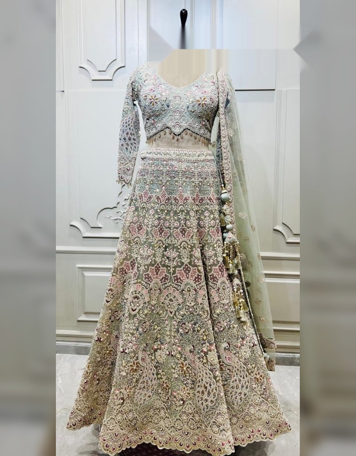 Sage green heavily embroidered lehenga set with dupatta at Raunak Boutique Epping, Melbourne